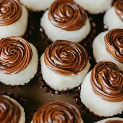 A delightful array of homemade pastries with rich chocolate spirals on top.